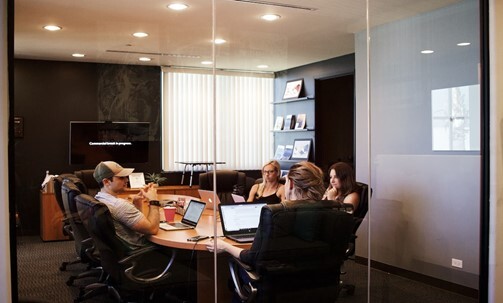 Employees Discussing about a project at a Digital Marketing Agency 

